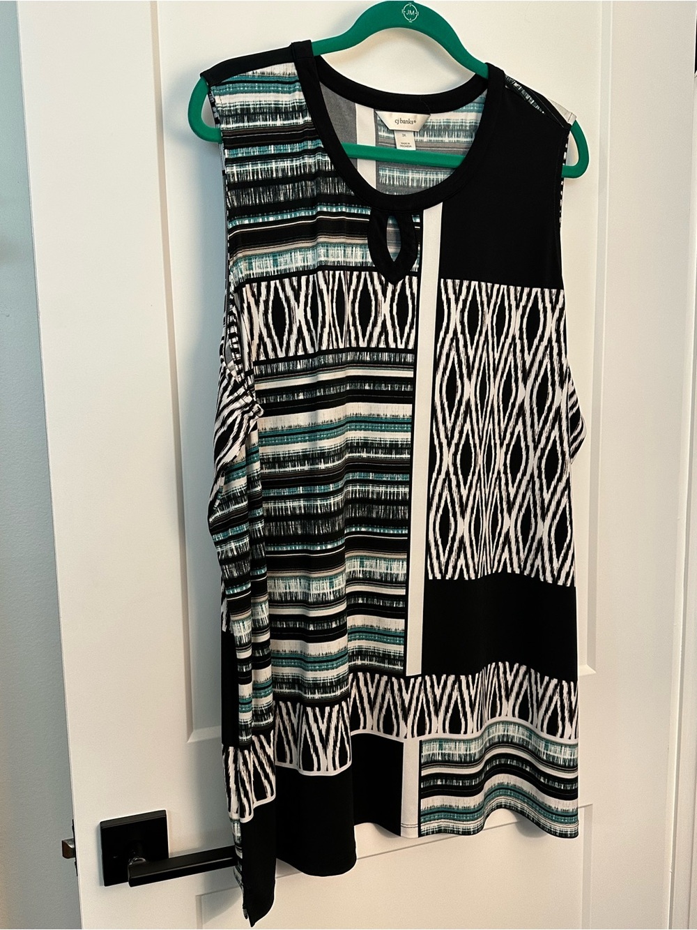 Ladies CJBanks keyhole neck pullover blouse in black/white/green print. Size 3X